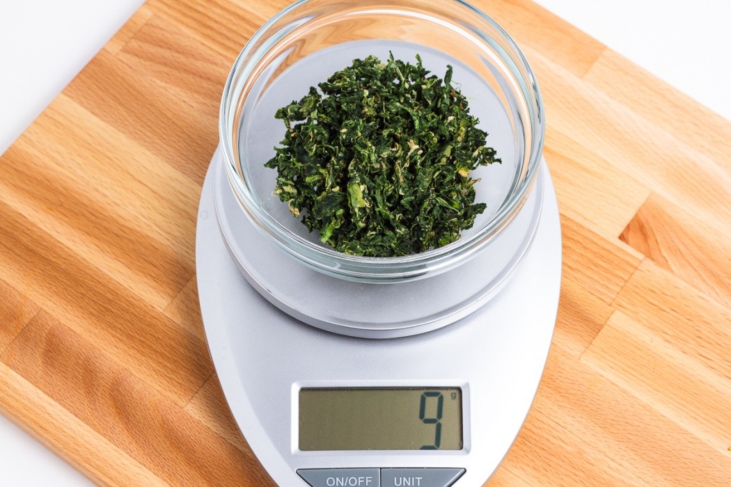 Dried spinach is very brittle and dries to a very small size 9 grams of dehydrated chopped spinach