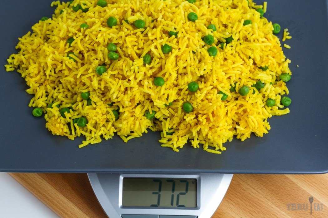 golden basmati rice on a scale