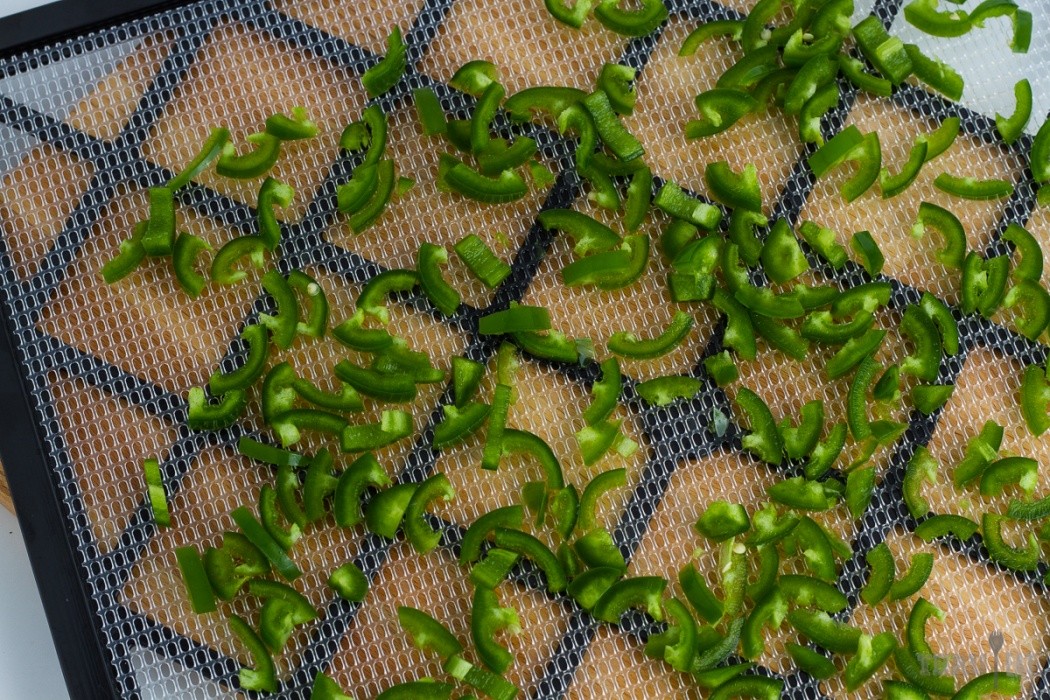 jalapenos on a dehydrator tray