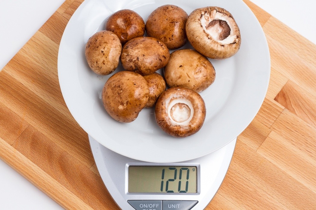 120 grams of baby bella mushroom on a scale