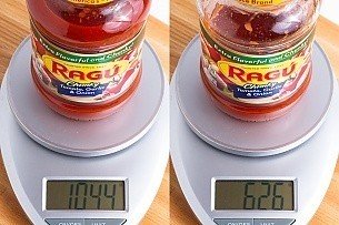 jar of Ragu pasta sauce on a scale