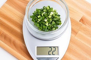22 grams of green onion on a scale