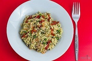 pesto shrimp orzo with peas and sun dried tomatoes