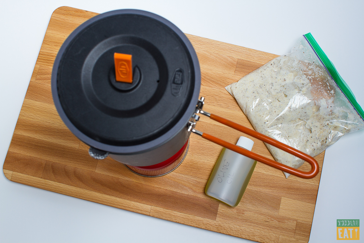 dehydrated backpacking chicken and dumplings covered in a pot